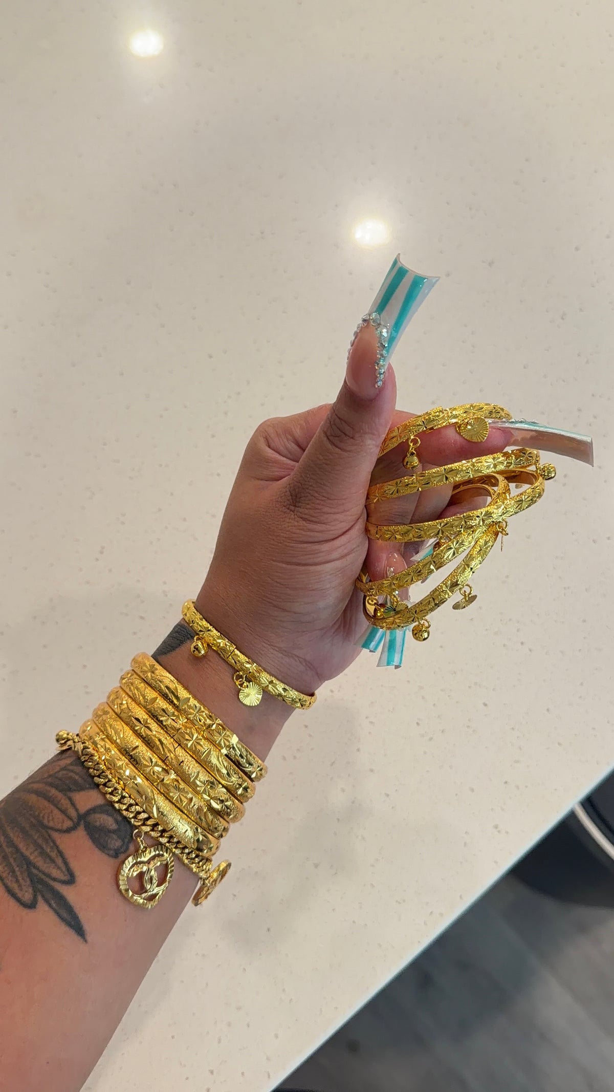 24 dangly heart charm bangle
