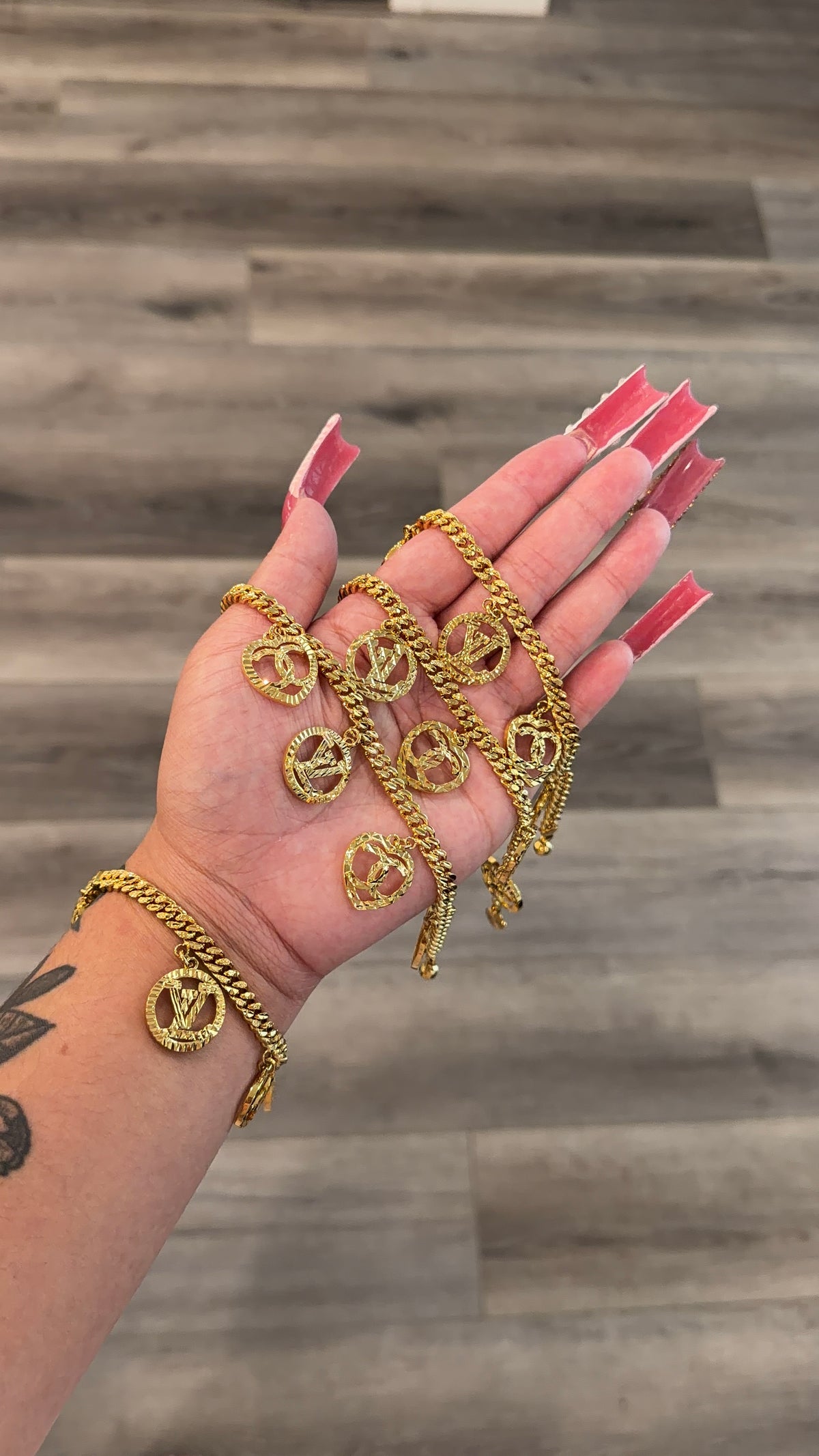 24 dangling LV/CC Charm Bracelet