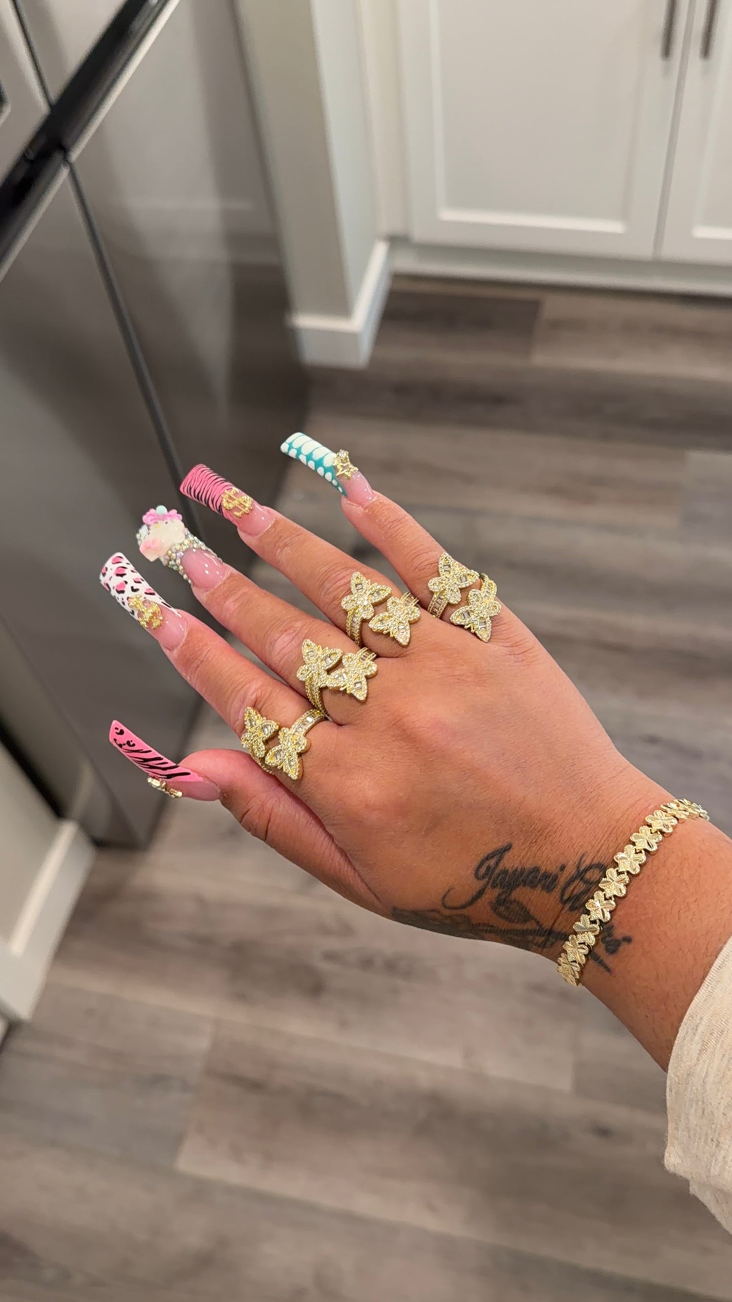 Adjustable butterfly ring