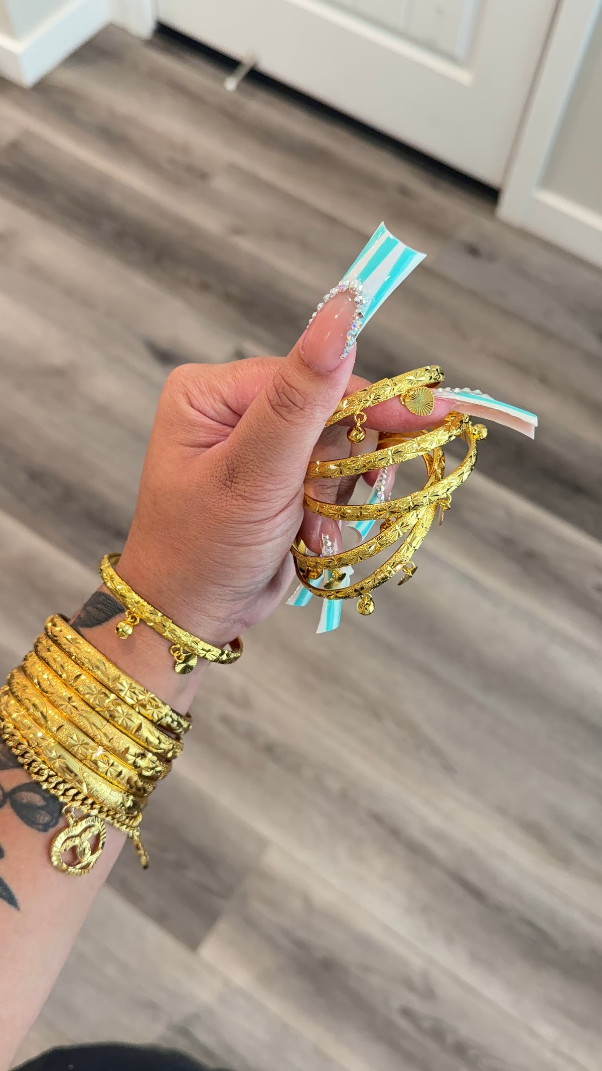 24 dangly heart charm bangle