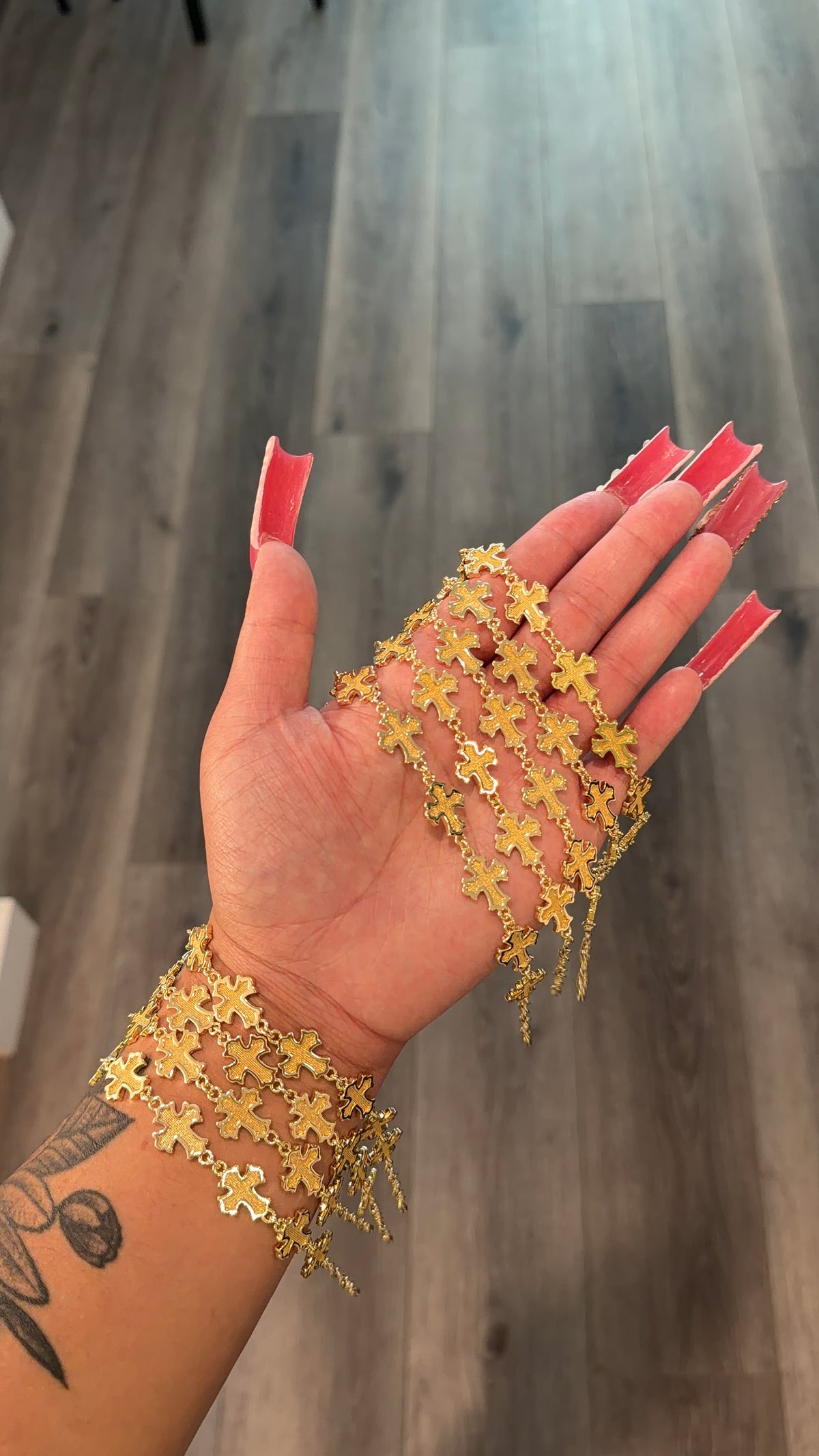 Thick gold cross bracelet