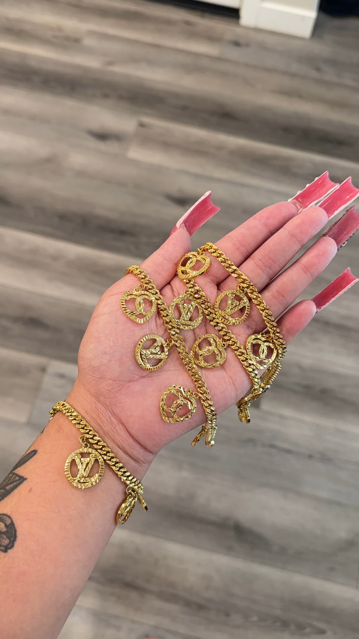 24 dangling LV/CC Charm Bracelet