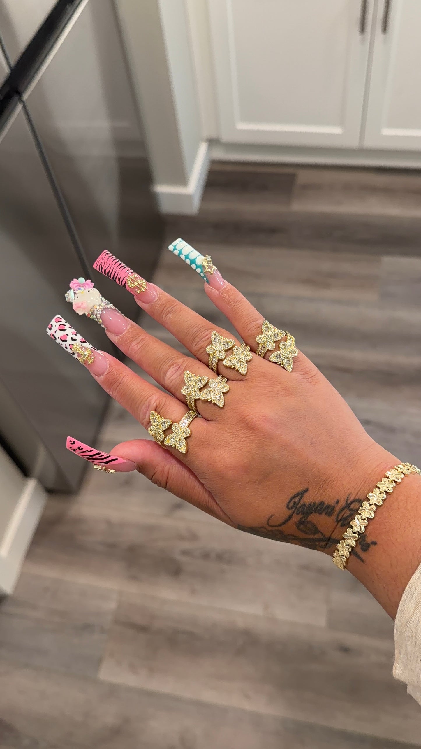 Adjustable butterfly ring